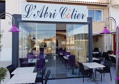 Terrasse de restaurant en verres coulissant pour une exploitation toute l’année à Marseillan à coté de Sète 34 Herault