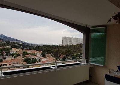 Fermeture de balcon en verre totalement ouvrant (rideau de verre) Résidence Le Sisley Marseille 13009